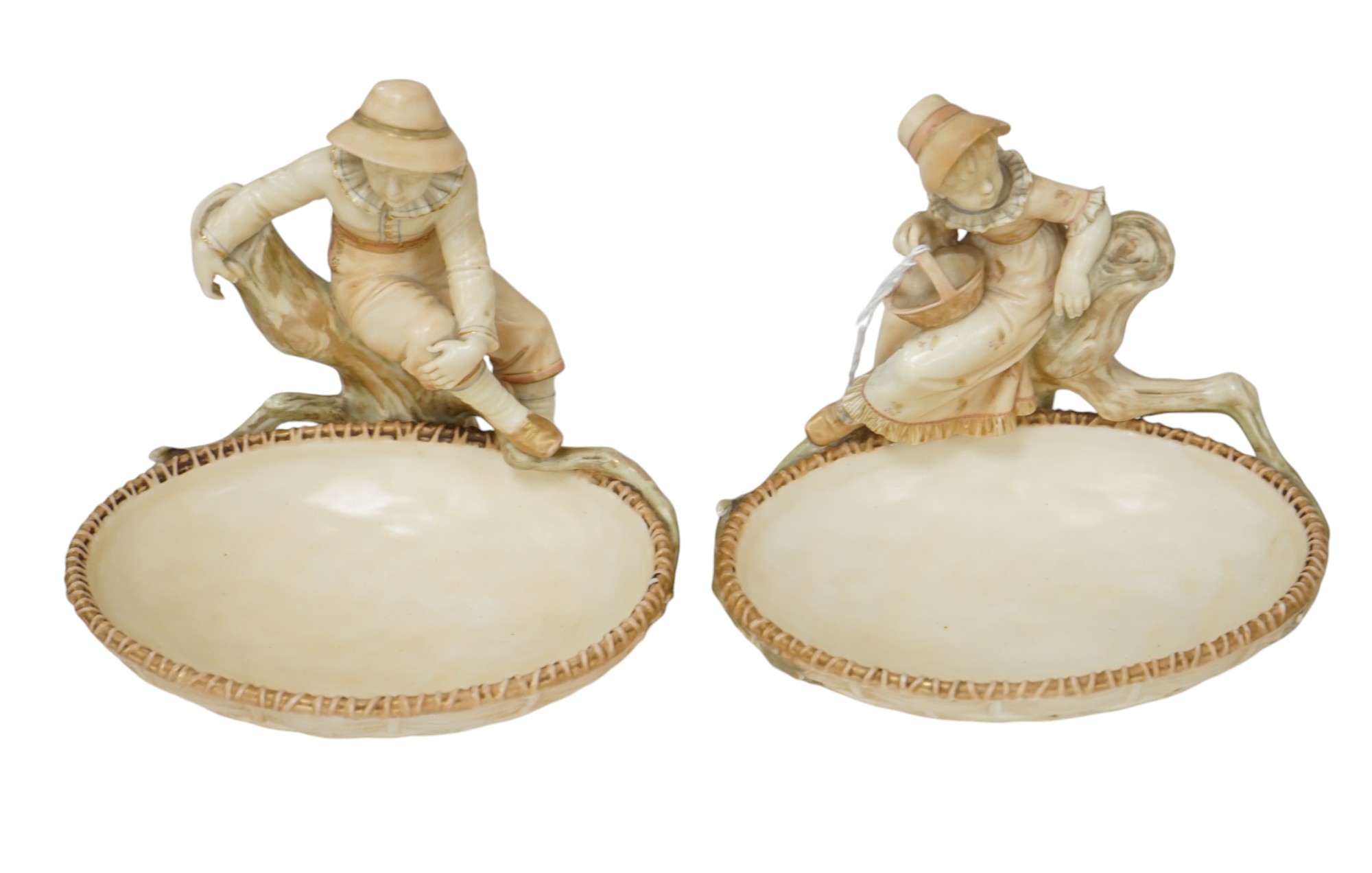 A pair of Royal Worcester sweetmeat dishes modelled by James Hadley, impressed numbers 775 and 776, 16cm. Condition - good